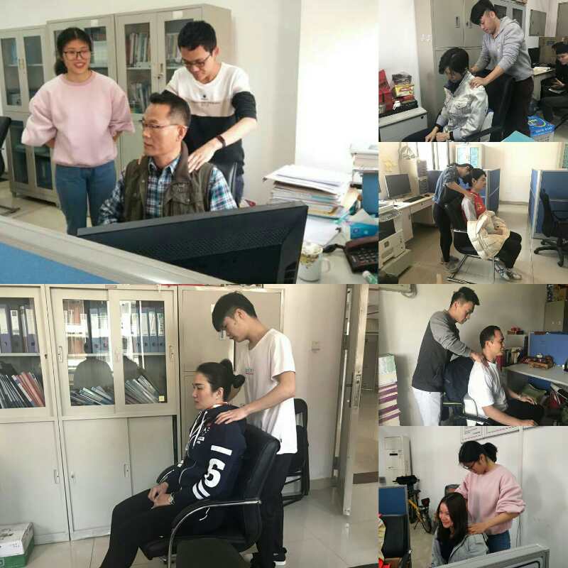 誌願者為各部門教職工進行推拿康復